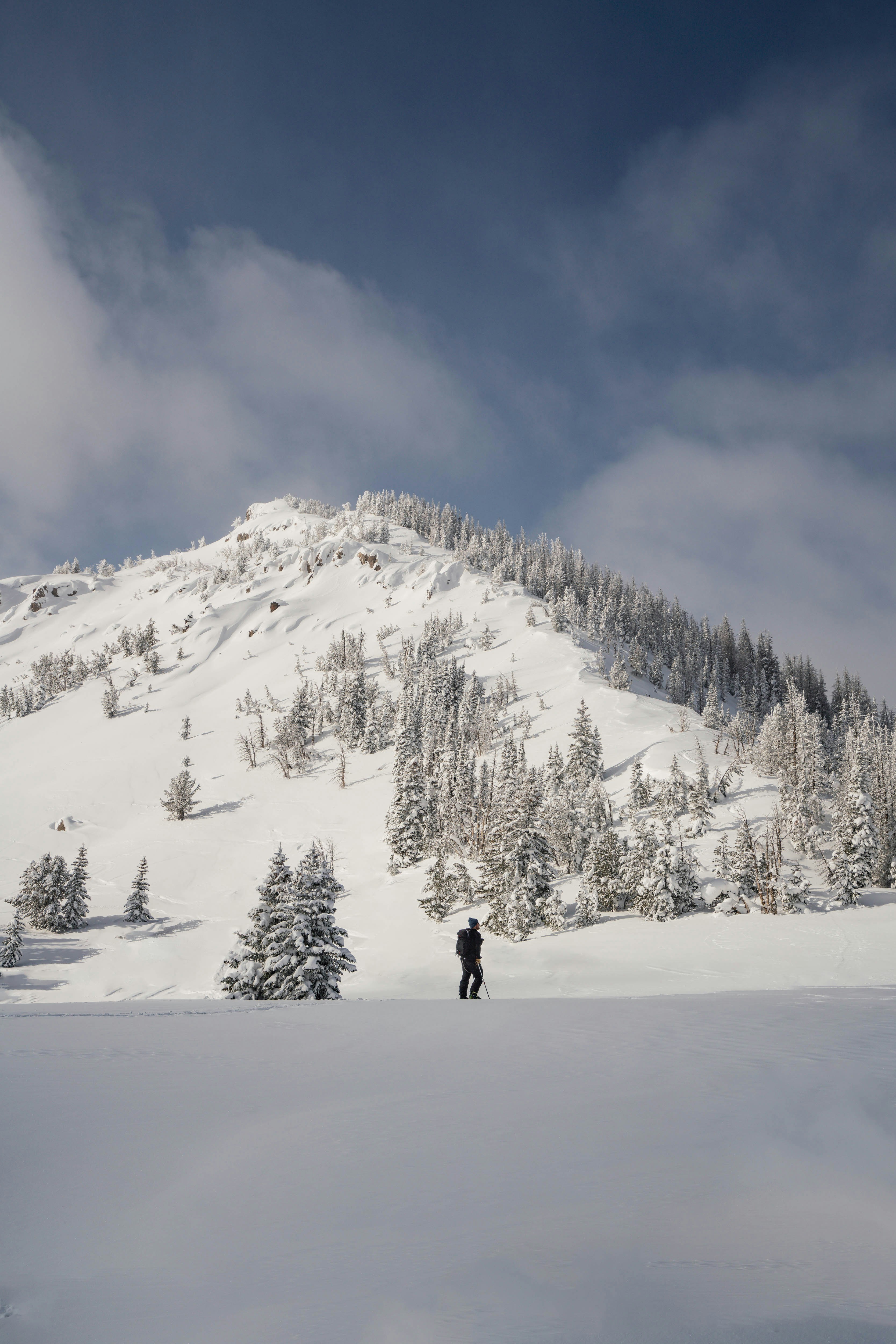 man trekking in a snowy mountain